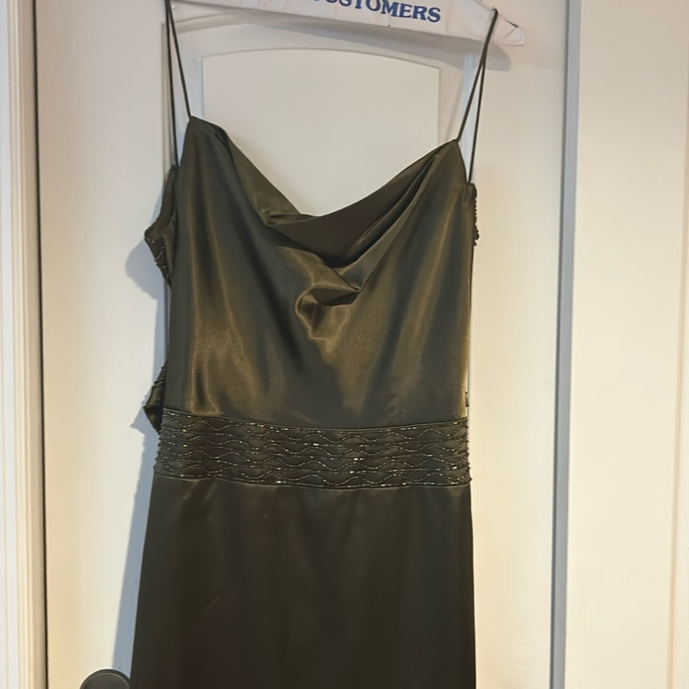 Olive green sexy satin dress with beading details. Worn once. Strappy back.
